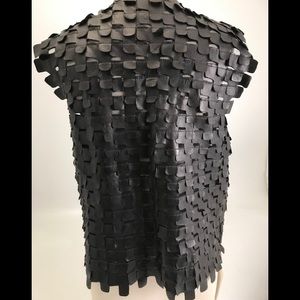 Leather vest made of recycled vegetable tanned Napa leather. All black/new tag.